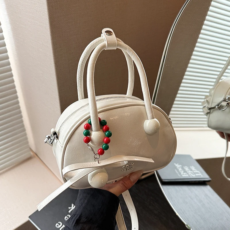 Niche handbags2026New bowling bag with high aesthetic appeal, single shoulder crossbody bag
Niche handbags2026New bowling bag with high aesthetic appeal, single shoulder crossbody bag