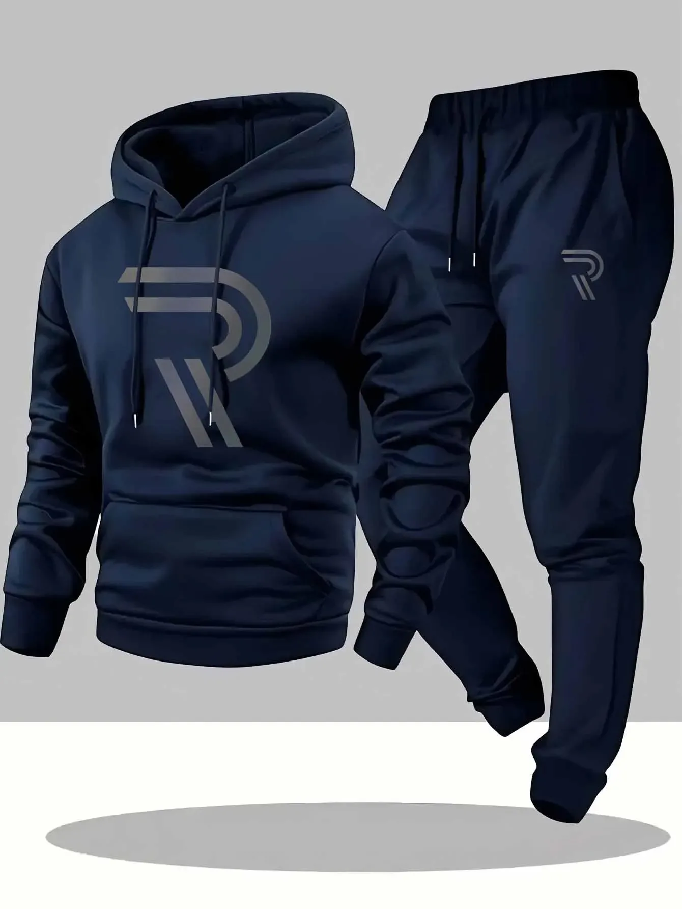 Мужской спортивный комплект из двух предметов: толстовка и брюки серого и черного цвета с логотипом, неэластичный, стандартного кроя с карманами на осень/зиму
Мужской спортивный комплект из двух предметов: толстовка и брюки серого и черного цвета с логотипом, неэластичный, стандартного кроя с карманами на осень/зиму