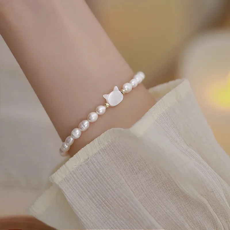 Minar Cute 14K Gold Plated Brass White Natural Shell Cartoon Cat Head Oval Freshwater Pearl Strand Charm Bracelets for Women
Minar Cute 14K Gold Plated Brass White Natural Shell Cartoon Cat Head Oval Freshwater Pearl Strand Charm Bracelets for Women