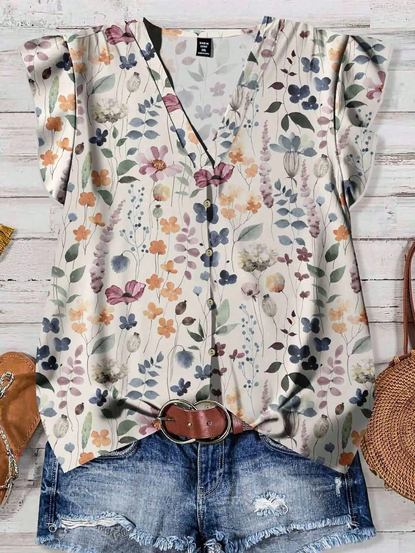 Женская блузка с цветочным принтом, V-образным вырезом и короткими рукавами, свободного кроя, летний топ с пуговицами спереди
Женская блузка с цветочным принтом, V-образным вырезом и короткими рукавами, свободного кроя, летний топ с пуговицами спереди