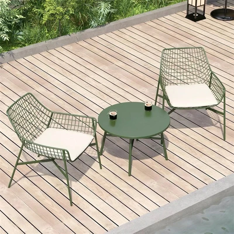 Outdoor table and chair combination simple courtyard balcony meeting guests open-air wrought iron round table
Outdoor table and chair combination simple courtyard balcony meeting guests open-air wrought iron round table