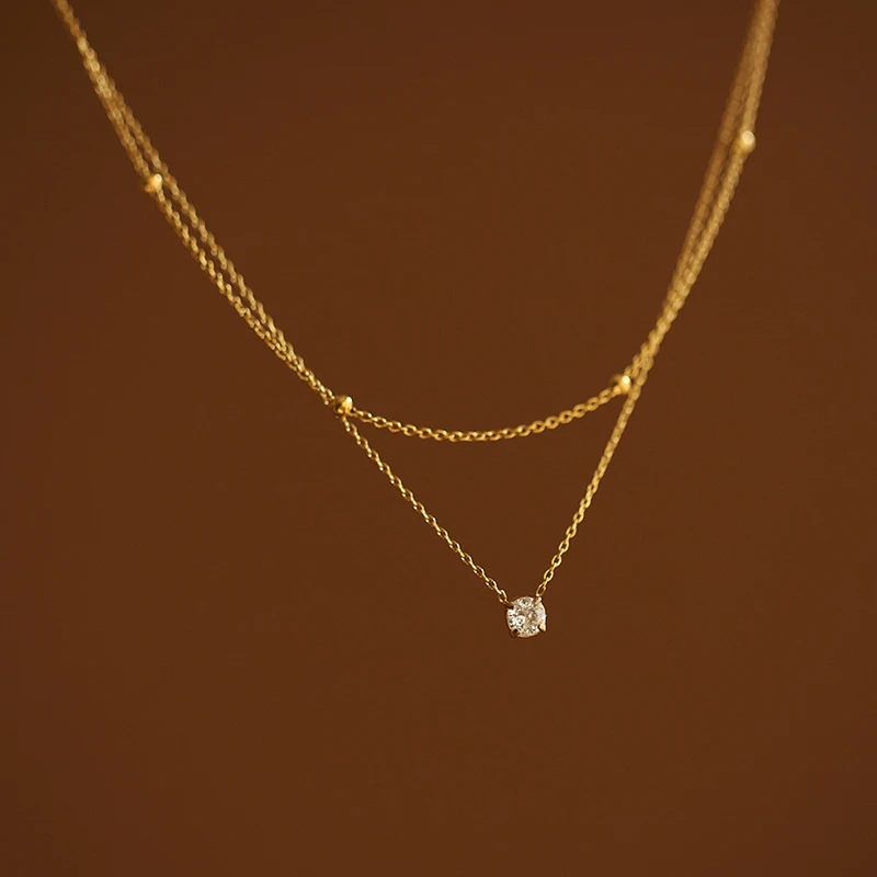 Ponykiss Gold Color Zircon Double Layer Chain Pendant Necklace for Women Classic Fashion Jewelry Minimalist Accessory
Ponykiss Gold Color Zircon Double Layer Chain Pendant Necklace for Women Classic Fashion Jewelry Minimalist Accessory
