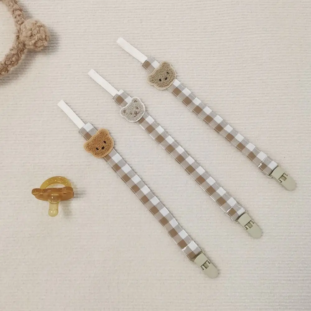 Милая вышивка, детская тканевая цепочка для соски, решетчатый держатель для пустышки с медведем, регулируемые зажимы для пустышки, зажимы для держателя соски, детские
Милая вышивка, детская тканевая цепочка для соски, решетчатый держатель для пустышки с медведем, регулируемые зажимы для пустышки, зажимы для держателя соски, детские