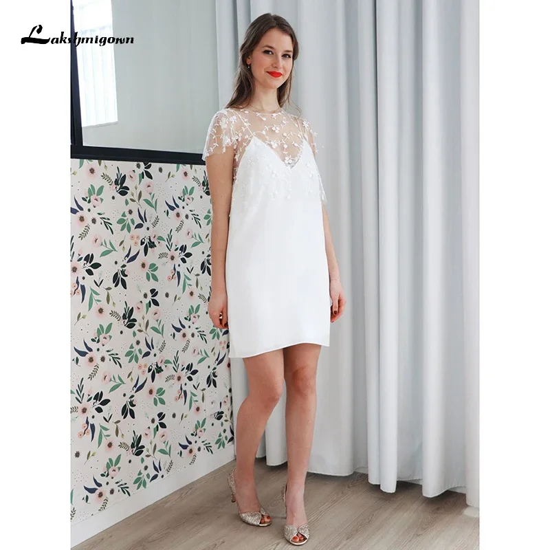 Lovely V-neck Two-piece Top Lace Sheath Mini Wedding Dresses 2025 Chiffon Bride Gowns Short Cap Sleeve Backless Button vestidos
Lovely V-neck Two-piece Top Lace Sheath Mini Wedding Dresses 2025 Chiffon Bride Gowns Short Cap Sleeve Backless Button vestidos