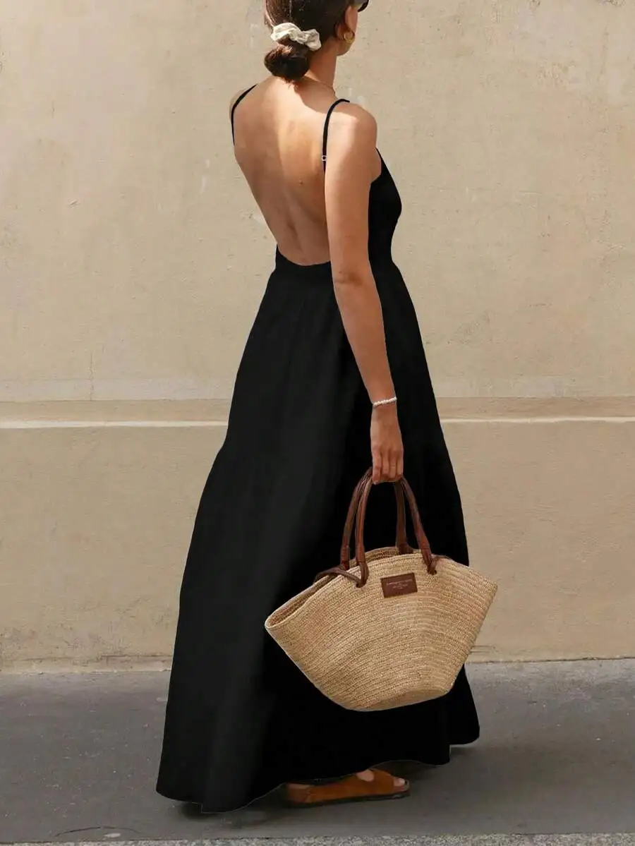 Women's Black Open-Back Sleeveless Maxi Dress with Ruffled Hem, Lightweight & Flowy for Resort or Casual Wear
Women's Black Open-Back Sleeveless Maxi Dress with Ruffled Hem, Lightweight & Flowy for Resort or Casual Wear