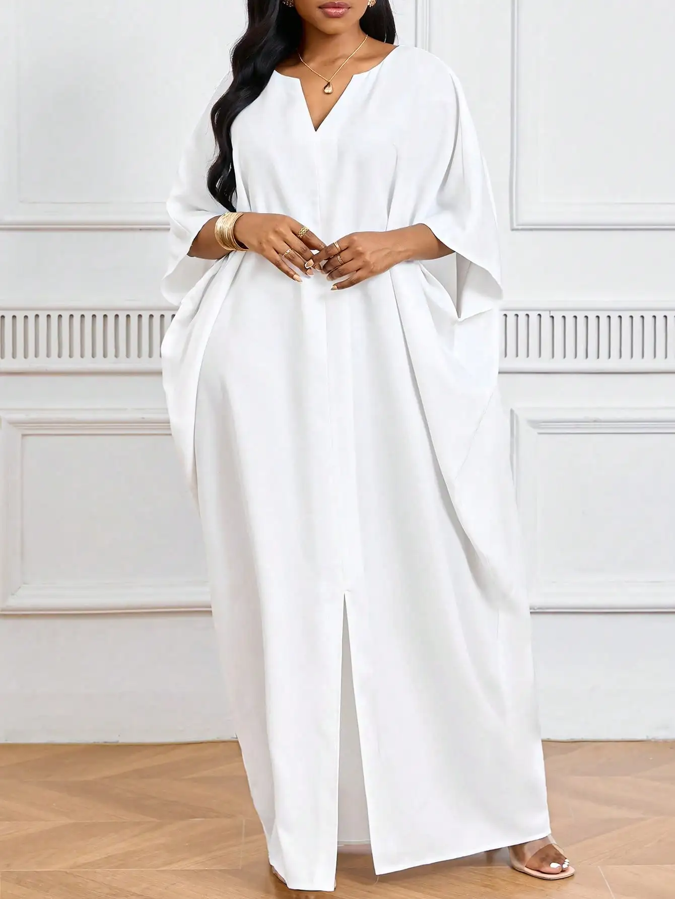 White V-Neck Loose Caftan Dress with Side Slit and Cape Sleeves
White V-Neck Loose Caftan Dress with Side Slit and Cape Sleeves