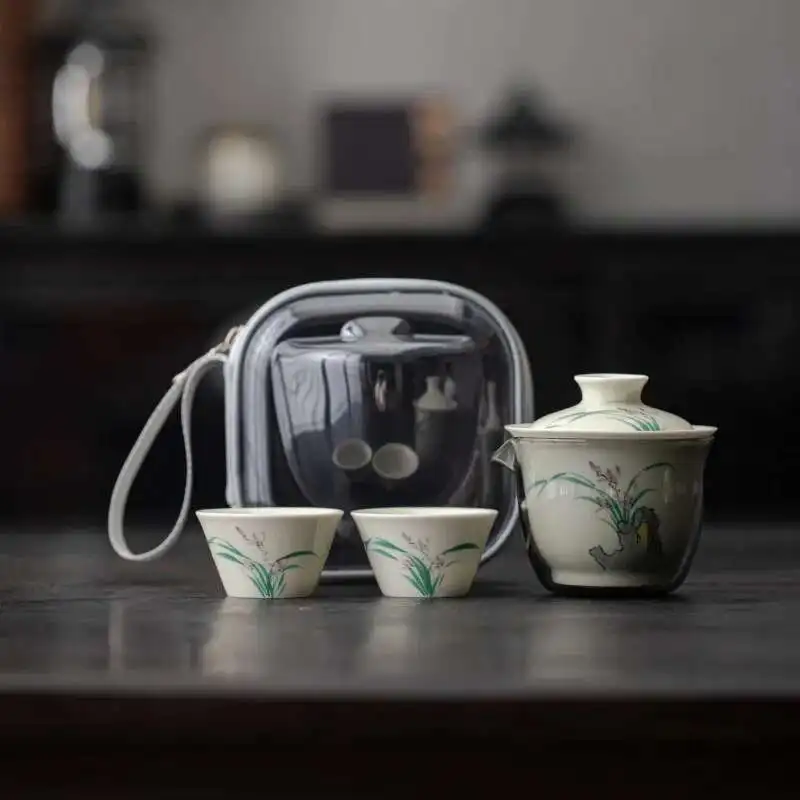 Portable Travel Tea Set Underglaze Color Hand-painted Orchid Ceramic Quick Guest Cup One Pot Two Cups Outdoor Tea Maker
Portable Travel Tea Set Underglaze Color Hand-painted Orchid Ceramic Quick Guest Cup One Pot Two Cups Outdoor Tea Maker