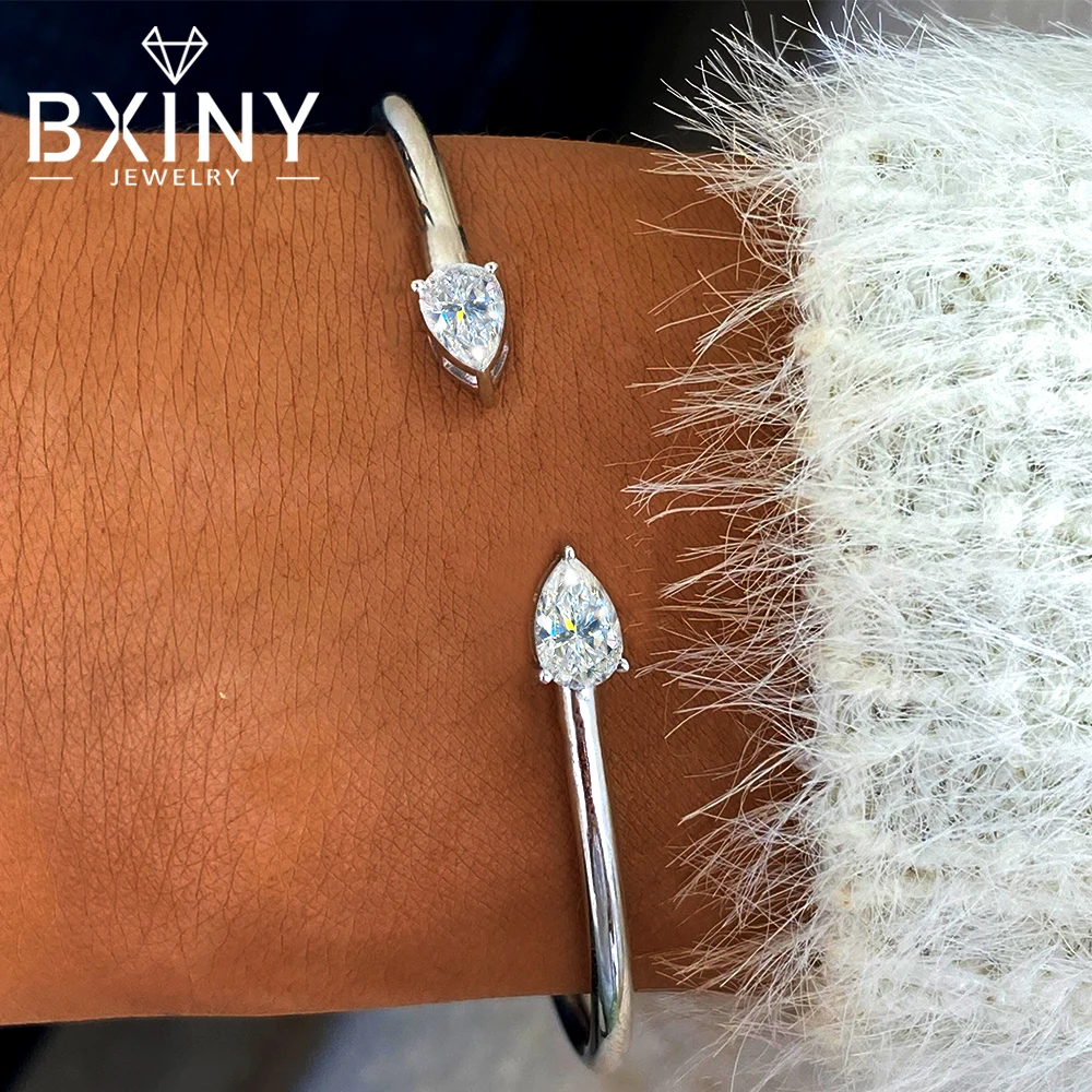 BXINY 2-Stone Pear Cut Moissanite Open Bangle S925 Silver WaterDrop Diamond Adjustable Bracelet for Women Party Gift Jewelry GRA
BXINY 2-Stone Pear Cut Moissanite Open Bangle S925 Silver WaterDrop Diamond Adjustable Bracelet for Women Party Gift Jewelry GRA