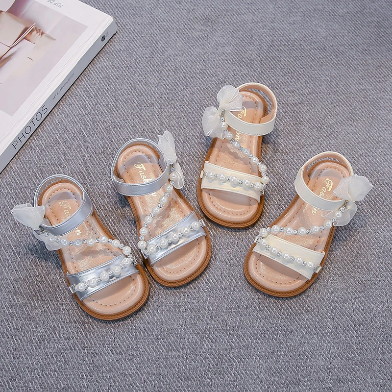 Girls Beach Shoes Side Bows Kids Princess Shoes Sweet Beading 2025 Summer New Children Sandals Open Toes Ins Trendy Soft Sole
Girls Beach Shoes Side Bows Kids Princess Shoes Sweet Beading 2025 Summer New Children Sandals Open Toes Ins Trendy Soft Sole