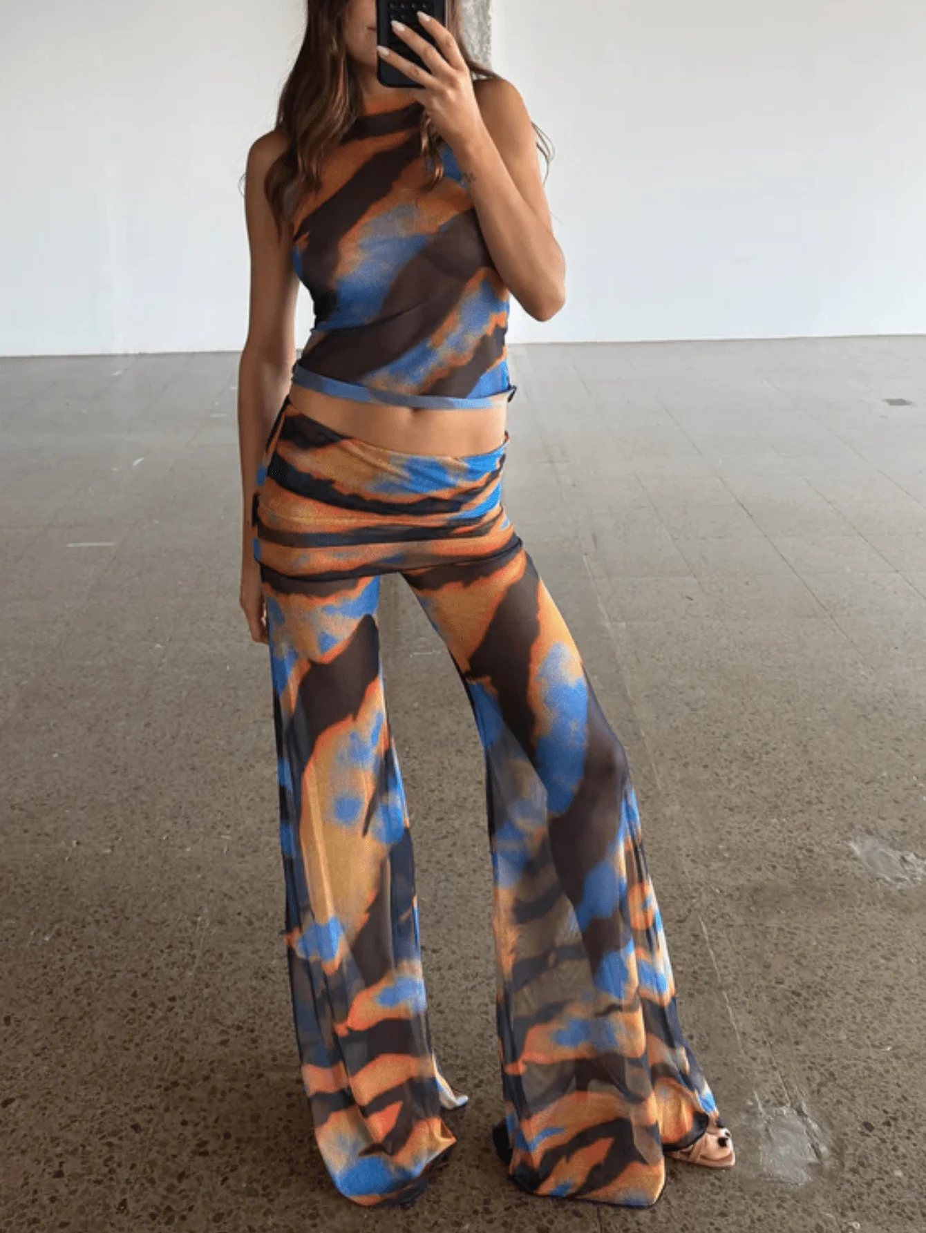 Women Sheer Flared Pants Summer Loose Fit Abstract Print Wide Leg Pants For Beach Vacation
Women Sheer Flared Pants Summer Loose Fit Abstract Print Wide Leg Pants For Beach Vacation