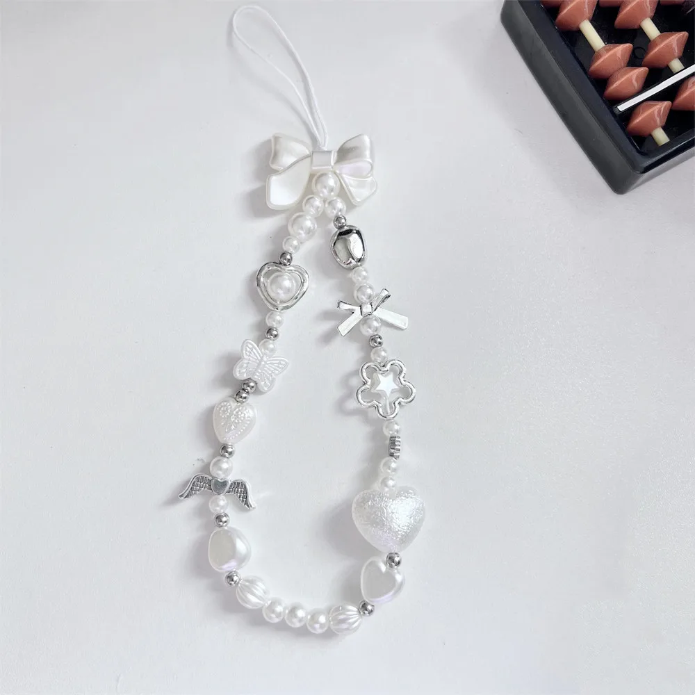 Барочная цепочка для телефона с искусственным жемчугом и бисером, очаровательный ремешок, милый белый бант в стиле барокко, цветок, очаровательные аксессуары для телефона, ювелирные изделия, кулон
Барочная цепочка для телефона с искусственным жемчугом и бисером, очаровательный ремешок, милый белый бант в стиле барокко, цветок, очаровательные аксессуары для телефона, ювелирные изделия, кулон