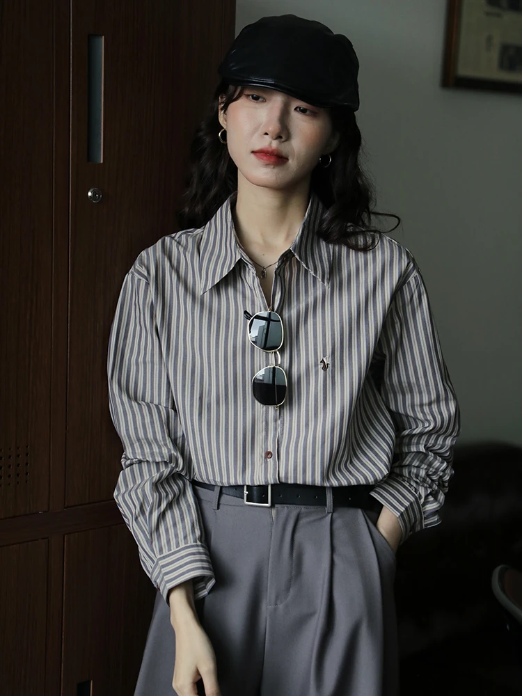 Женская рубашка в ретро-стиле с полосками, вышивкой, свободного кроя, с длинным рукавом, универсальная, комфортная, из смесового хлопка, для делового и повседневного стиля
Женская рубашка в ретро-стиле с полосками, вышивкой, свободного кроя, с длинным рукавом, универсальная, комфортная, из смесового хлопка, для делового и повседневного стиля