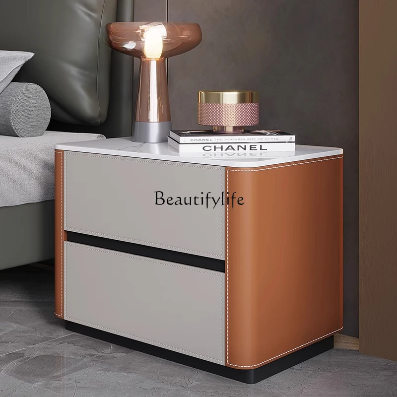 Saddle leather rock slab bedside table modern bedroom solid wood storage cabinet leather art
Saddle leather rock slab bedside table modern bedroom solid wood storage cabinet leather art