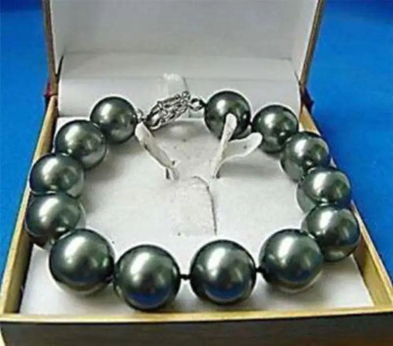 Rare 12mm Genuine Black Round Sea Shell Pearl Bracelet Bangle 7.5"
Rare 12mm Genuine Black Round Sea Shell Pearl Bracelet Bangle 7.5"