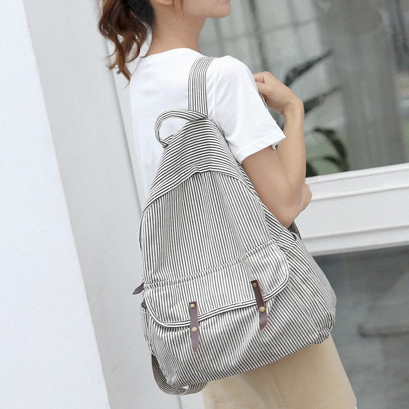 Original New Striped Canvas Backpack Female Korean Version of All College Style Canvas Backpack Color Contrast Canvas Schoolbag
Original New Striped Canvas Backpack Female Korean Version of All College Style Canvas Backpack Color Contrast Canvas Schoolbag