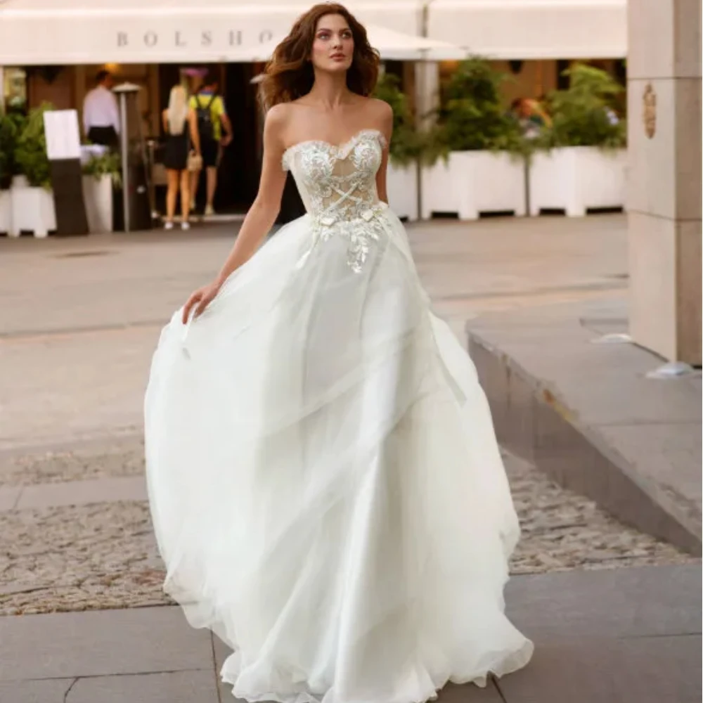 2024 New A Line Wedding Dresses Strapless Ribbon Beads Appliques Tulle Bridal Gowns Sweep Train Custom Made Vestidos De Novia
2024 New A Line Wedding Dresses Strapless Ribbon Beads Appliques Tulle Bridal Gowns Sweep Train Custom Made Vestidos De Novia