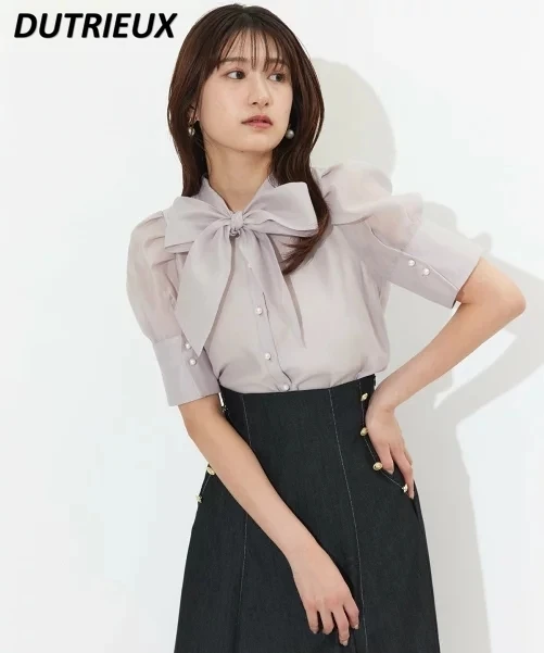 2023 Summer New Puff Short Sleeve Shirt Fashion Solid Color Elegant Tops Chiffon See-through Bow Tie Women's Shirt Blouse
2023 Summer New Puff Short Sleeve Shirt Fashion Solid Color Elegant Tops Chiffon See-through Bow Tie Women's Shirt Blouse