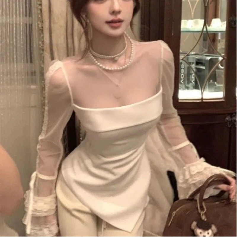 Осенние японские модные новые женские топы нестандартного дизайна, сетчатая кружевная футболка с длинными рукавами, шикарная утягивающая элегантная одежда
Осенние японские модные новые женские топы нестандартного дизайна, сетчатая кружевная футболка с длинными рукавами, шикарная утягивающая элегантная одежда