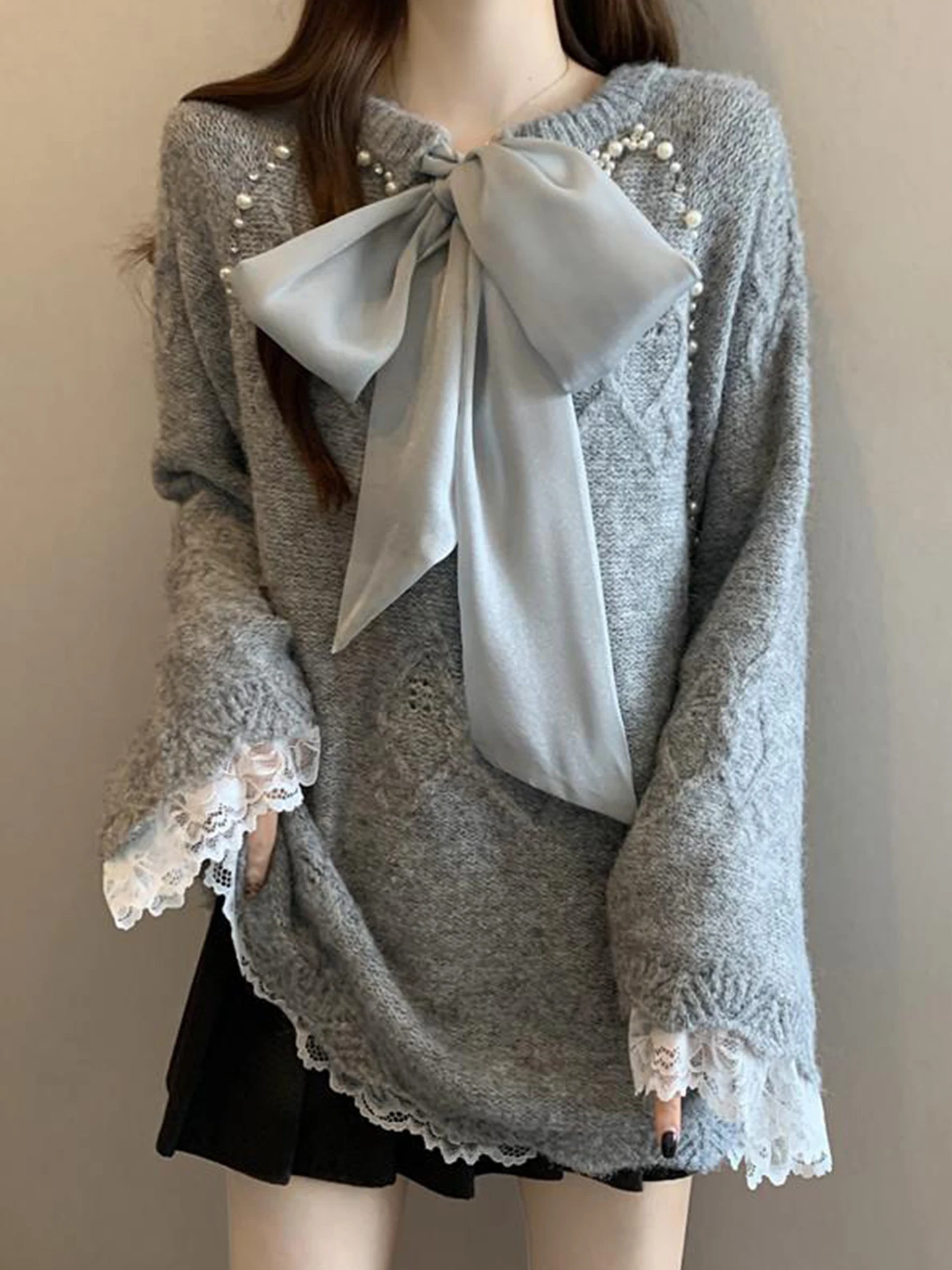 Женский свитер с кружевными вставками и бусинами, осенне-зимний, больших размеров, свободный, средней длины, вязаный топ, повседневный стиль
Женский свитер с кружевными вставками и бусинами, осенне-зимний, больших размеров, свободный, средней длины, вязаный топ, повседневный стиль