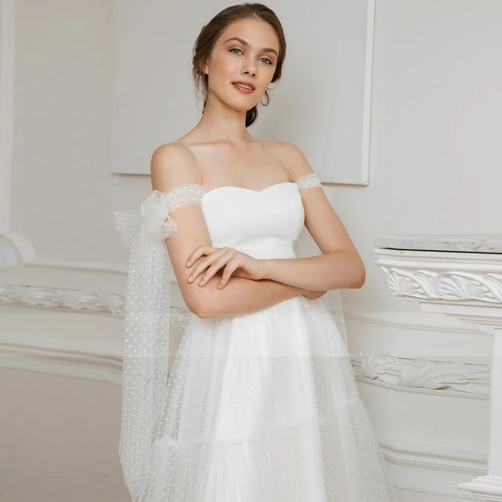 Custom Short Wedding Dress for Women 2026 Bride Off Shoulder A Line Wedding Gown Midi Sweetheart Tea Length Simple Wedding Dress
Custom Short Wedding Dress for Women 2026 Bride Off Shoulder A Line Wedding Gown Midi Sweetheart Tea Length Simple Wedding Dress
