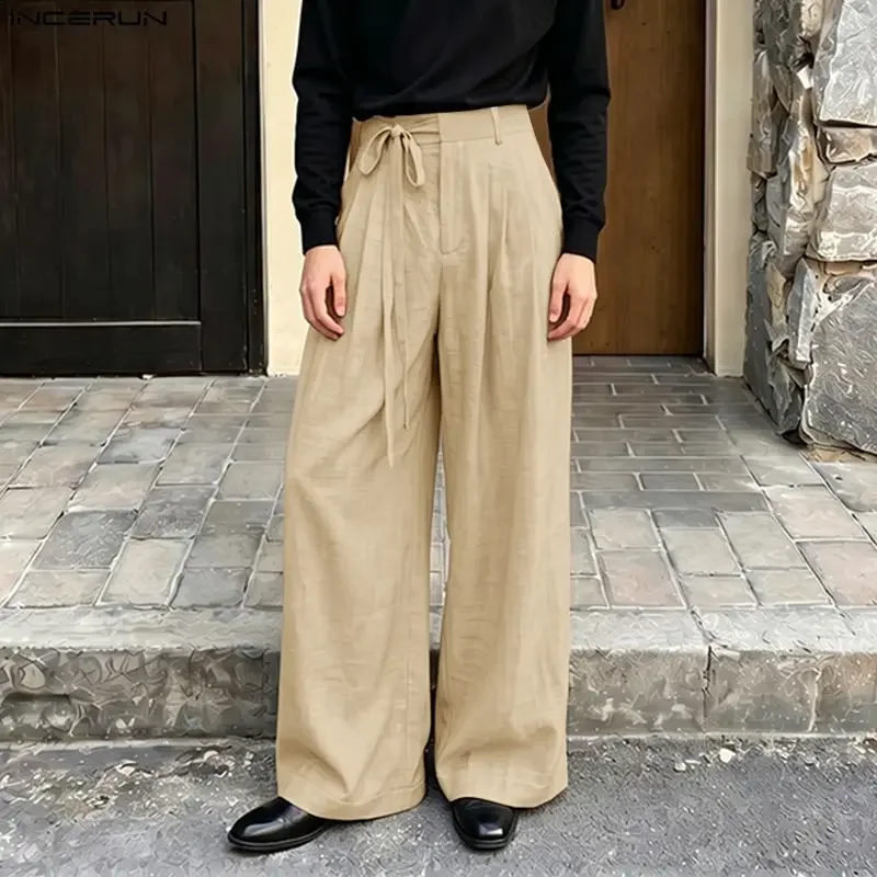 INCERUN Men's Pants Solid Color Lace Up Joggers Loose Pleated Wide Leg Pants For Man Pantalones Streetwear 2026 Casual Trousers
INCERUN Men's Pants Solid Color Lace Up Joggers Loose Pleated Wide Leg Pants For Man Pantalones Streetwear 2026 Casual Trousers