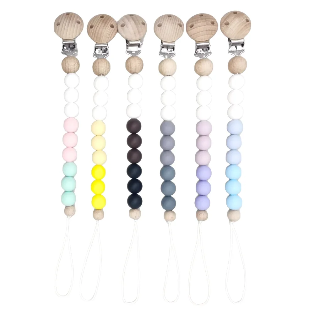 Wooden Baby Pacifier Clip Silicone Multi-color Chain Nipple Holder Infant Soother Teether
Wooden Baby Pacifier Clip Silicone Multi-color Chain Nipple Holder Infant Soother Teether