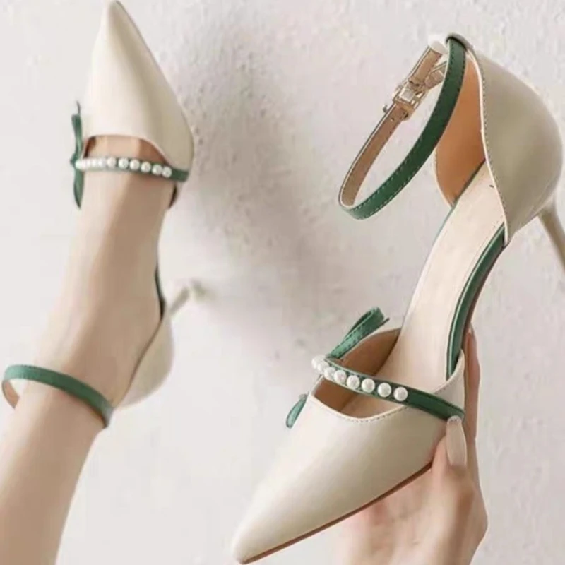 One Buckle Strap High Heel Sandals Women Stiletto Heel Spring 2026 Pearl Pointed Toe Temperament Single Shoes
One Buckle Strap High Heel Sandals Women Stiletto Heel Spring 2026 Pearl Pointed Toe Temperament Single Shoes