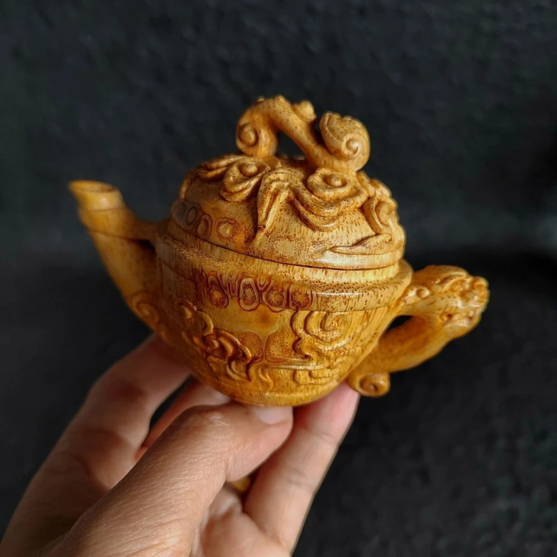 Carved bamboo root teapot auspicious cloud lion picture drinking tea handle ornament
Carved bamboo root teapot auspicious cloud lion picture drinking tea handle ornament