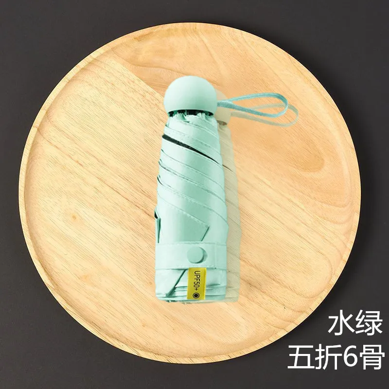 Mini Capsule Pocket Umbrella 5 Folding Sunny Rainy Women Paraguas Mujer Anti-UV SunshadeSunscreen Portable
Mini Capsule Pocket Umbrella 5 Folding Sunny Rainy Women Paraguas Mujer Anti-UV SunshadeSunscreen Portable
