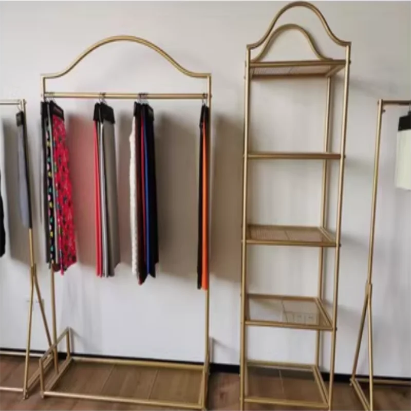 Стеллаж для демонстрации одежды IronworkClothing: комбинированный напольный стеллаж от пола до потолка для женской одежды, золотой стеллаж для демонстрации новой одежды, боковой стеллаж
Стеллаж для демонстрации одежды IronworkClothing: комбинированный напольный стеллаж от пола до потолка для женской одежды, золотой стеллаж для демонстрации новой одежды, боковой стеллаж