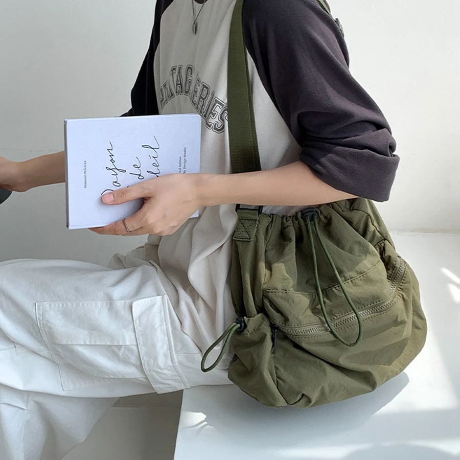 2024 Summer new drawstring bucket bag girls casual nylon design shoulder crossbody bag soild color purse and handbags beach tote
2024 Summer new drawstring bucket bag girls casual nylon design shoulder crossbody bag soild color purse and handbags beach tote