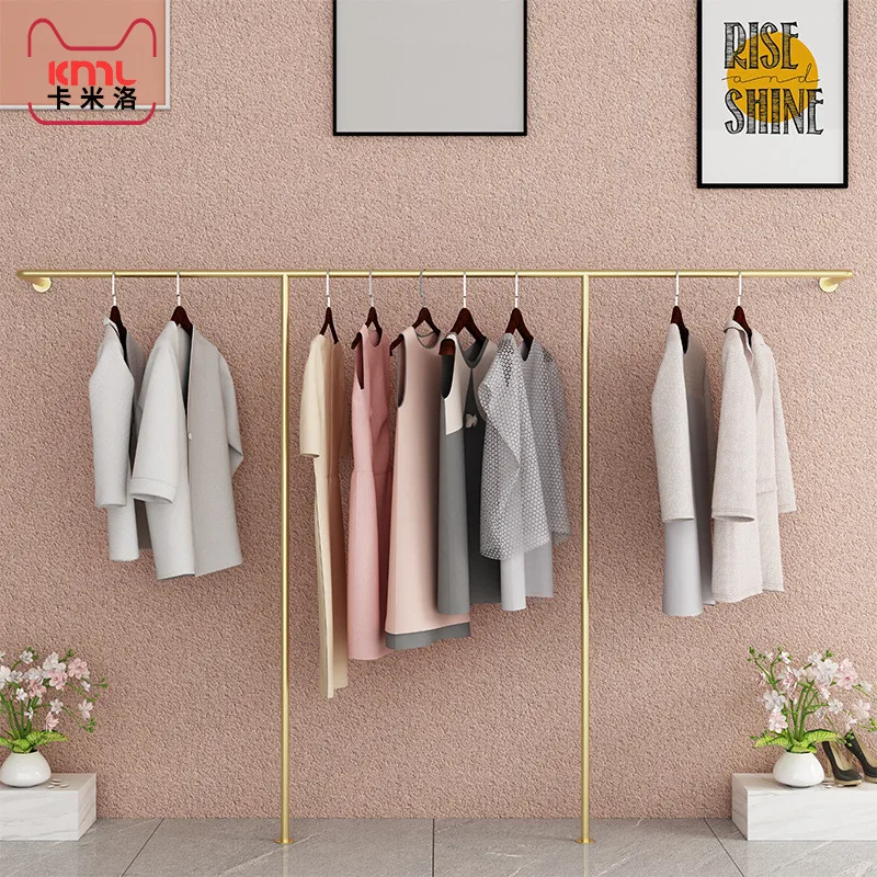 Wrought iron clothing store display racks, gold display racks, wall decoration, wall hangers, women's clothing, window clothes
Wrought iron clothing store display racks, gold display racks, wall decoration, wall hangers, women's clothing, window clothes