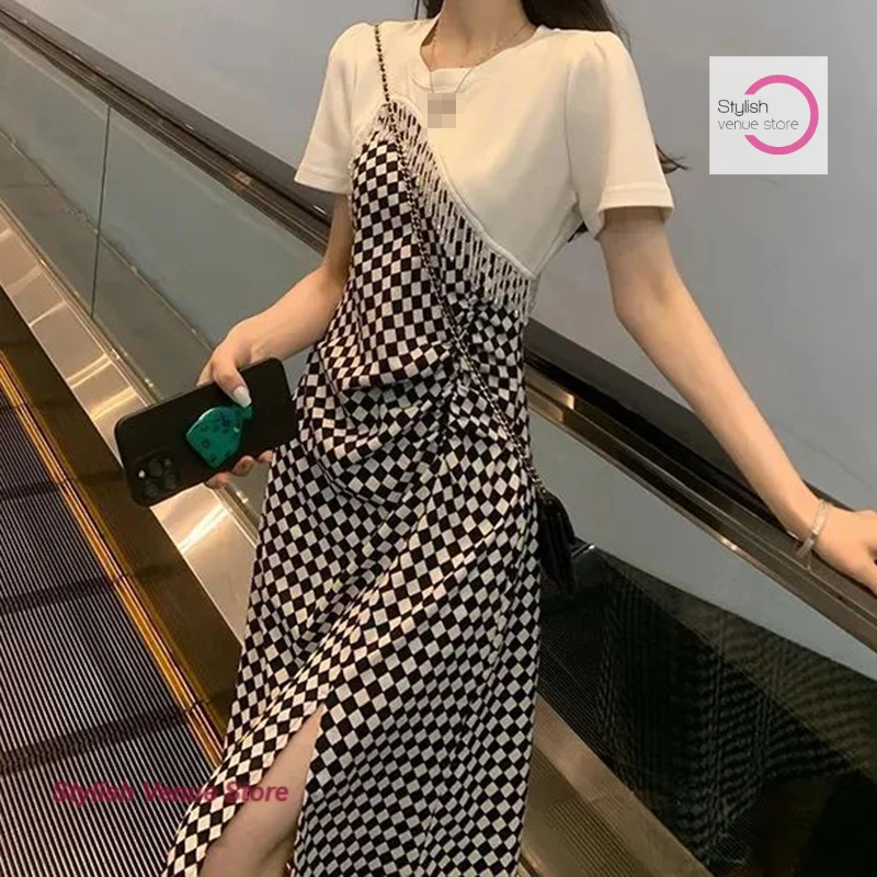 Korean-style fashion checkerboard long dress female summer new high-grade design temperament slim waist fake two casual skirts.
Korean-style fashion checkerboard long dress female summer new high-grade design temperament slim waist fake two casual skirts.