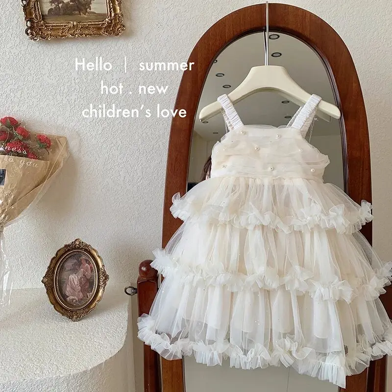 Летнее новое платье для девочек, детское платье на бретелях в стиле торт, пышная юбка, милое и элегантное, модная детская одежда
Летнее новое платье для девочек, детское платье на бретелях в стиле торт, пышная юбка, милое и элегантное, модная детская одежда
