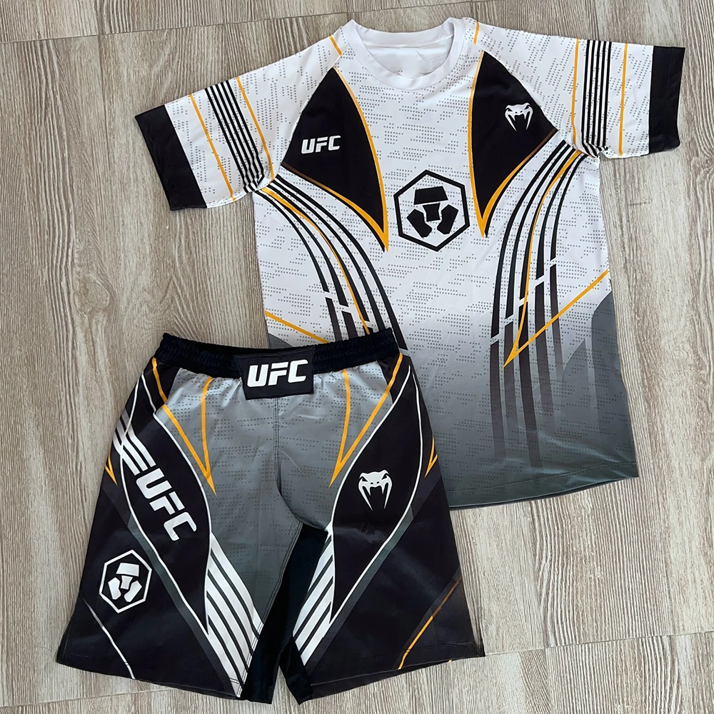 2026 New Hot Summer UFC Retro Fighting Night Boxing Set Men MMA Oversized Breathable Speed Drying Training Jujutsu Sports Set
2026 New Hot Summer UFC Retro Fighting Night Boxing Set Men MMA Oversized Breathable Speed Drying Training Jujutsu Sports Set