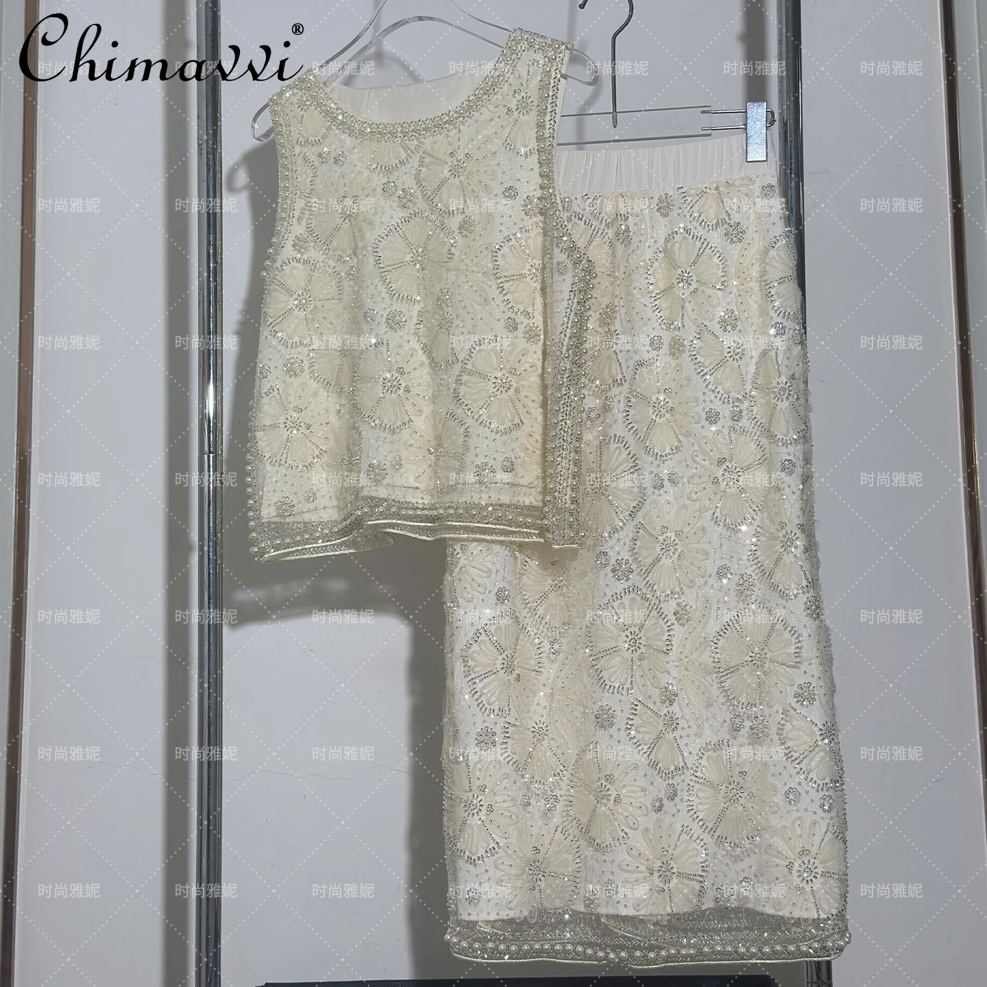 New Heavy Sequin Pearl Loose Flowing Floral Vest Top + Skirt Two-Piece Set 2025 Summer Clothes New Women's Streetwear Outfit
New Heavy Sequin Pearl Loose Flowing Floral Vest Top + Skirt Two-Piece Set 2025 Summer Clothes New Women's Streetwear Outfit