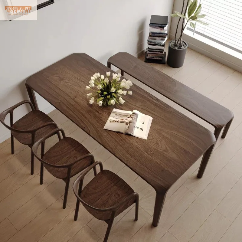 North American modern home walnut color mortise and tenon dining table rectangular light luxury simple solid wood tea table dini 
North American modern home walnut color mortise and tenon dining table rectangular light luxury simple solid wood tea table dini