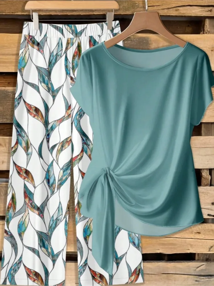 New Printed O Neck Short-sleeved T-shirt Trousers Women's 2-piece Set Fashion Knotted Top Wide-leg Trousers Casual Daily Suit
New Printed O Neck Short-sleeved T-shirt Trousers Women's 2-piece Set Fashion Knotted Top Wide-leg Trousers Casual Daily Suit