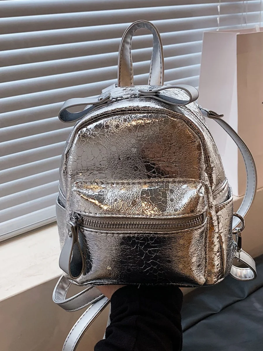 Luxury Design Silver Backpack for Women 2025 New Fashion and Versatile Student School Bags Summer Trendy Mini Backpack For Girl
Luxury Design Silver Backpack for Women 2025 New Fashion and Versatile Student School Bags Summer Trendy Mini Backpack For Girl