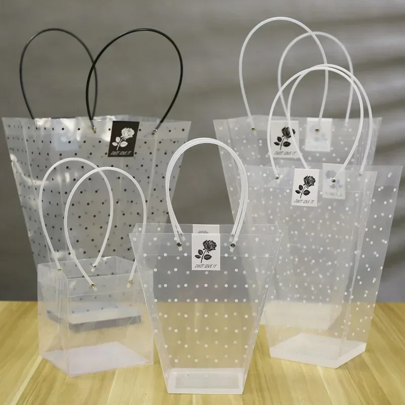 PP Transparent Trapezoid Portable Flower Bag Multi Size Waterproof Plastic Black Dots Flower Roses Gift Portable Packaging Bags
PP Transparent Trapezoid Portable Flower Bag Multi Size Waterproof Plastic Black Dots Flower Roses Gift Portable Packaging Bags
