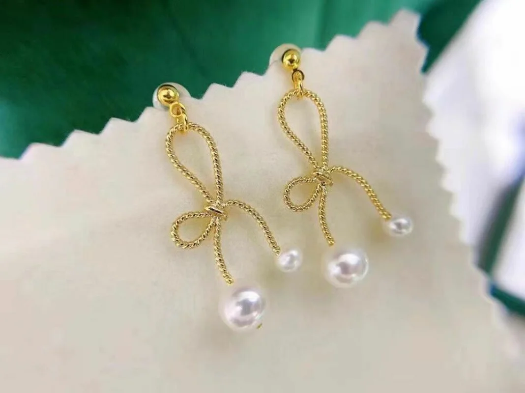 classic pair of 5-8mm south sea round white pearl dangle earring sterling silver 925 earrings jewelry for women
classic pair of 5-8mm south sea round white pearl dangle earring sterling silver 925 earrings jewelry for women