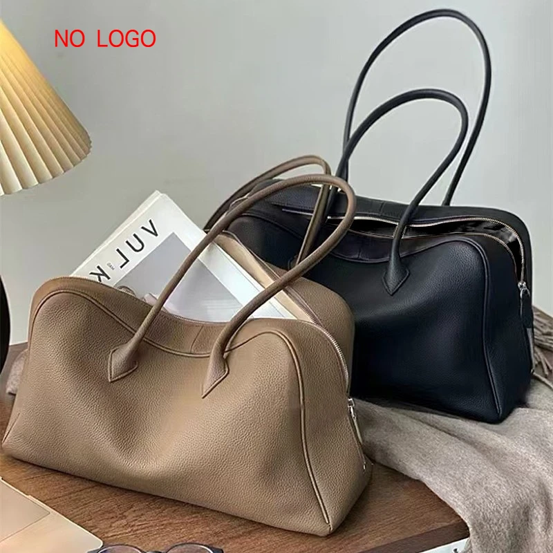 First layer togo cowhide niche design pillow bag bowling bag genuine leather large capacity shoulder underarm bag Boston
First layer togo cowhide niche design pillow bag bowling bag genuine leather large capacity shoulder underarm bag Boston