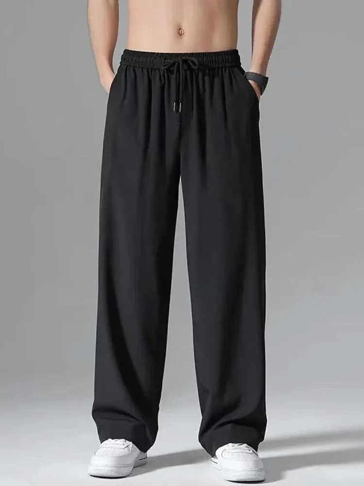 New Summer Sweatpants Male Casual Pants Black Gray Wide Pants Comfortable Running Sport Trousers Harem Pants Size 4XL
New Summer Sweatpants Male Casual Pants Black Gray Wide Pants Comfortable Running Sport Trousers Harem Pants Size 4XL