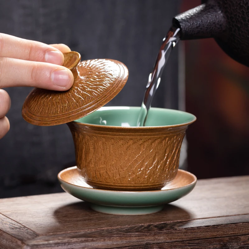 Longquan Celadon Sancai Gaiwan Tea Cup Single Cup Non-Hot Kung Fu Tea Set Ceramic Handmade Blind Dagger Large Tea Bowl
Longquan Celadon Sancai Gaiwan Tea Cup Single Cup Non-Hot Kung Fu Tea Set Ceramic Handmade Blind Dagger Large Tea Bowl
