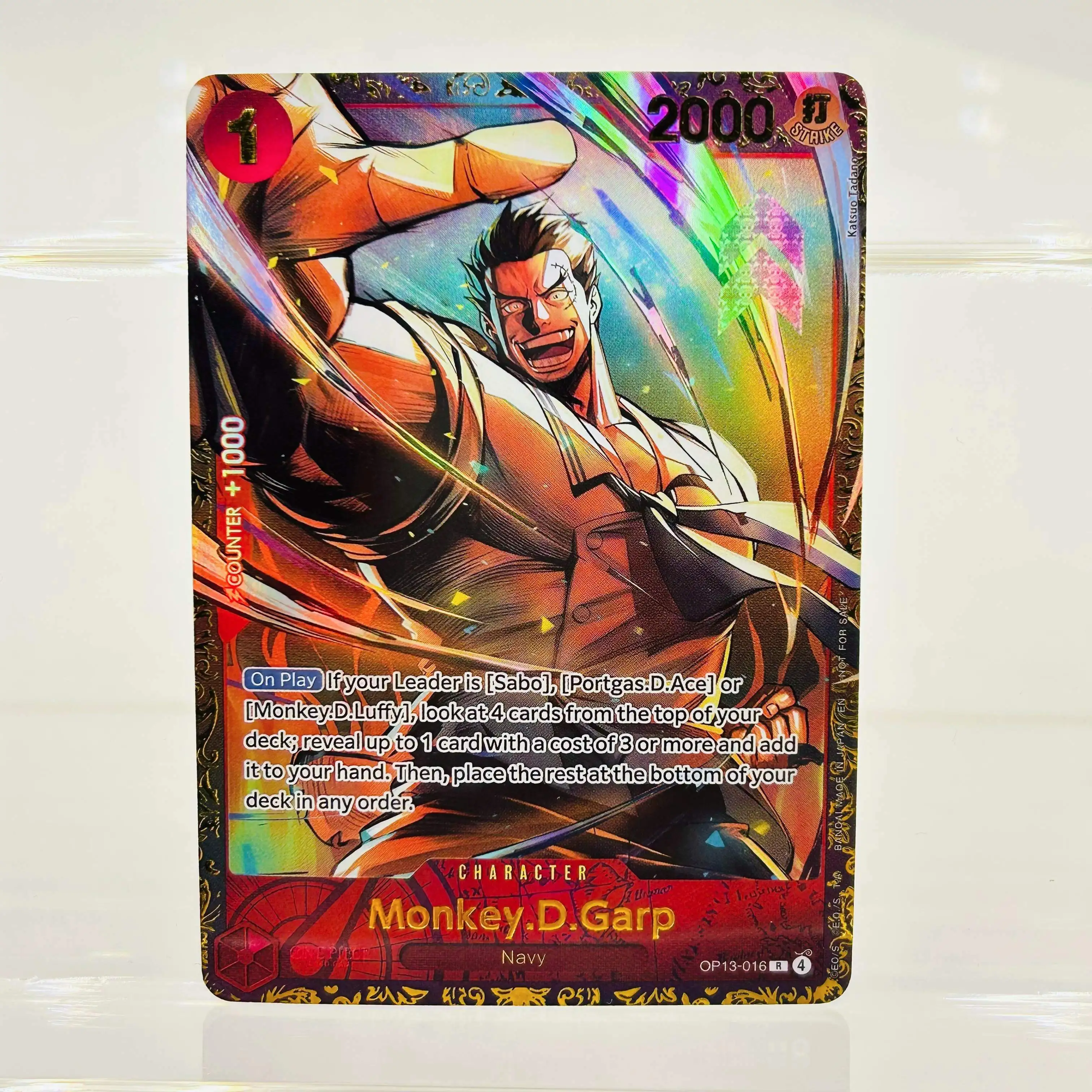 One Piece English OP13-016 R Monkey D. Garp DIY Gold Foil & Foil Texture Premium Anime Collection Card
One Piece English OP13-016 R Monkey D. Garp DIY Gold Foil & Foil Texture Premium Anime Collection Card