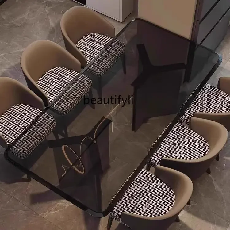 cqyTempered glass dining table suspended Italian household rectangular stainless steel dining table and chairs
cqyTempered glass dining table suspended Italian household rectangular stainless steel dining table and chairs