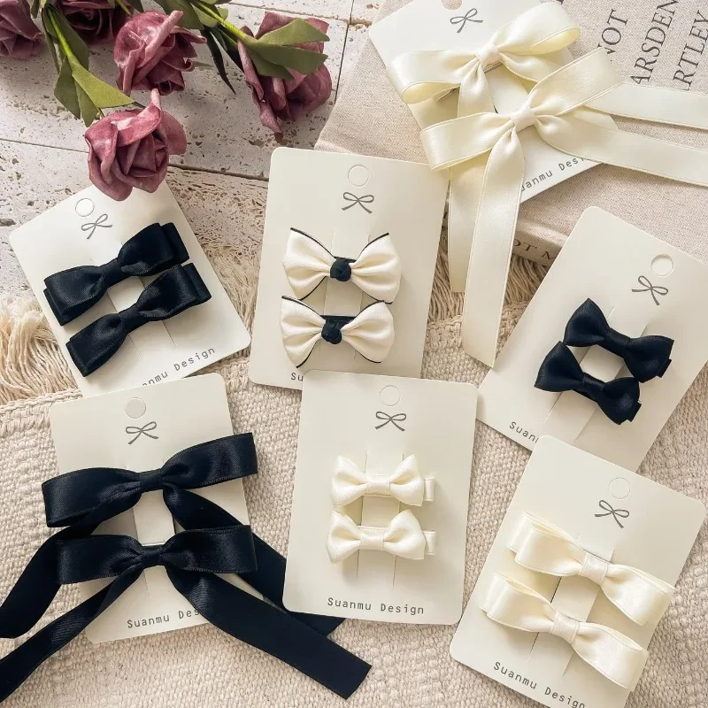 2pcs Kids Korean Fashion Princess Bow Hair Clip Simplicity White Black Color Barrettes for Children Cute BB's Clip Headwear
2pcs Kids Korean Fashion Princess Bow Hair Clip Simplicity White Black Color Barrettes for Children Cute BB's Clip Headwear