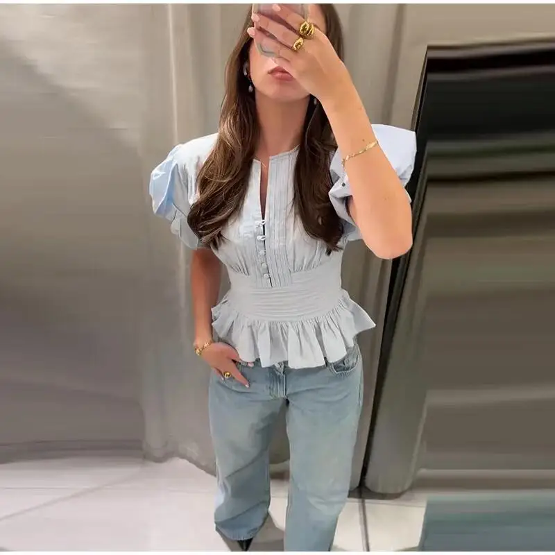 Summer 2026 New Blue Shirts Women O-Neck Single Breasted Puff Sleeve Smocked Waist Ruffle Hem Tops Female Casual Chic Blouse
Summer 2026 New Blue Shirts Women O-Neck Single Breasted Puff Sleeve Smocked Waist Ruffle Hem Tops Female Casual Chic Blouse