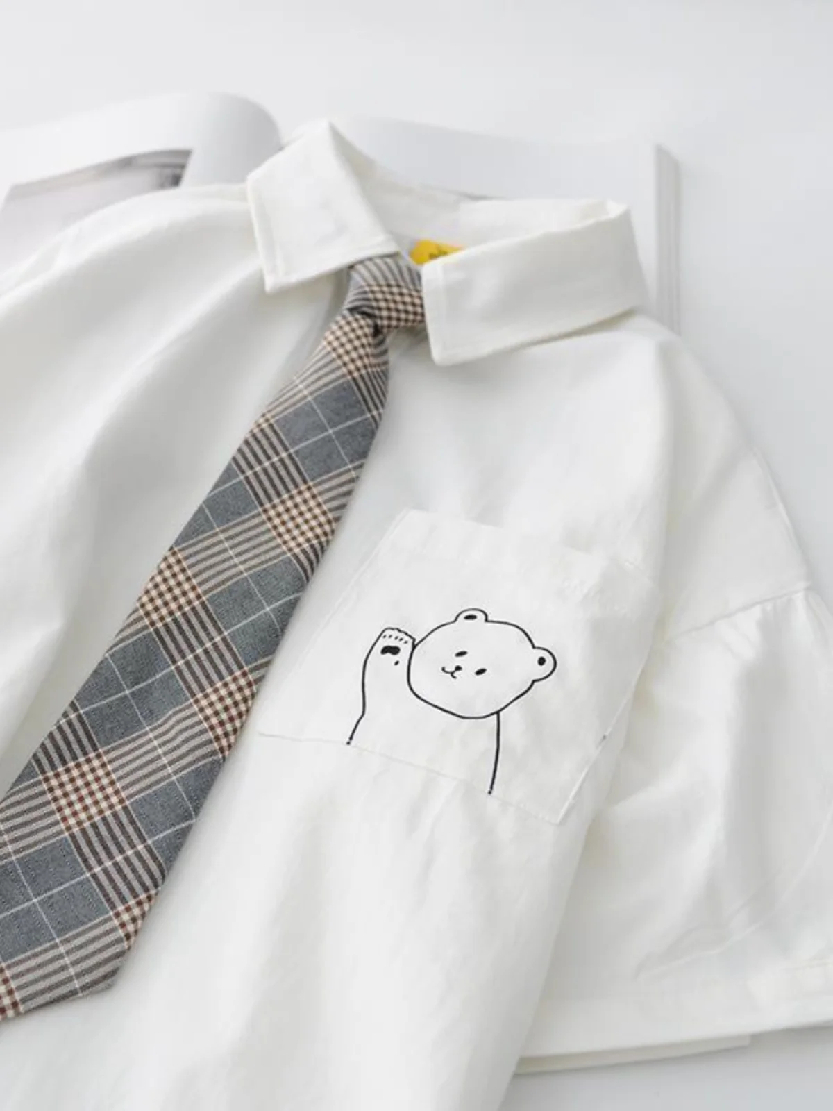 Cute Bear Print Shirt Short Sleeve Women's Fashion Artistic Design Korean Style And Youthful Feeling Summer Shirt
Cute Bear Print Shirt Short Sleeve Women's Fashion Artistic Design Korean Style And Youthful Feeling Summer Shirt