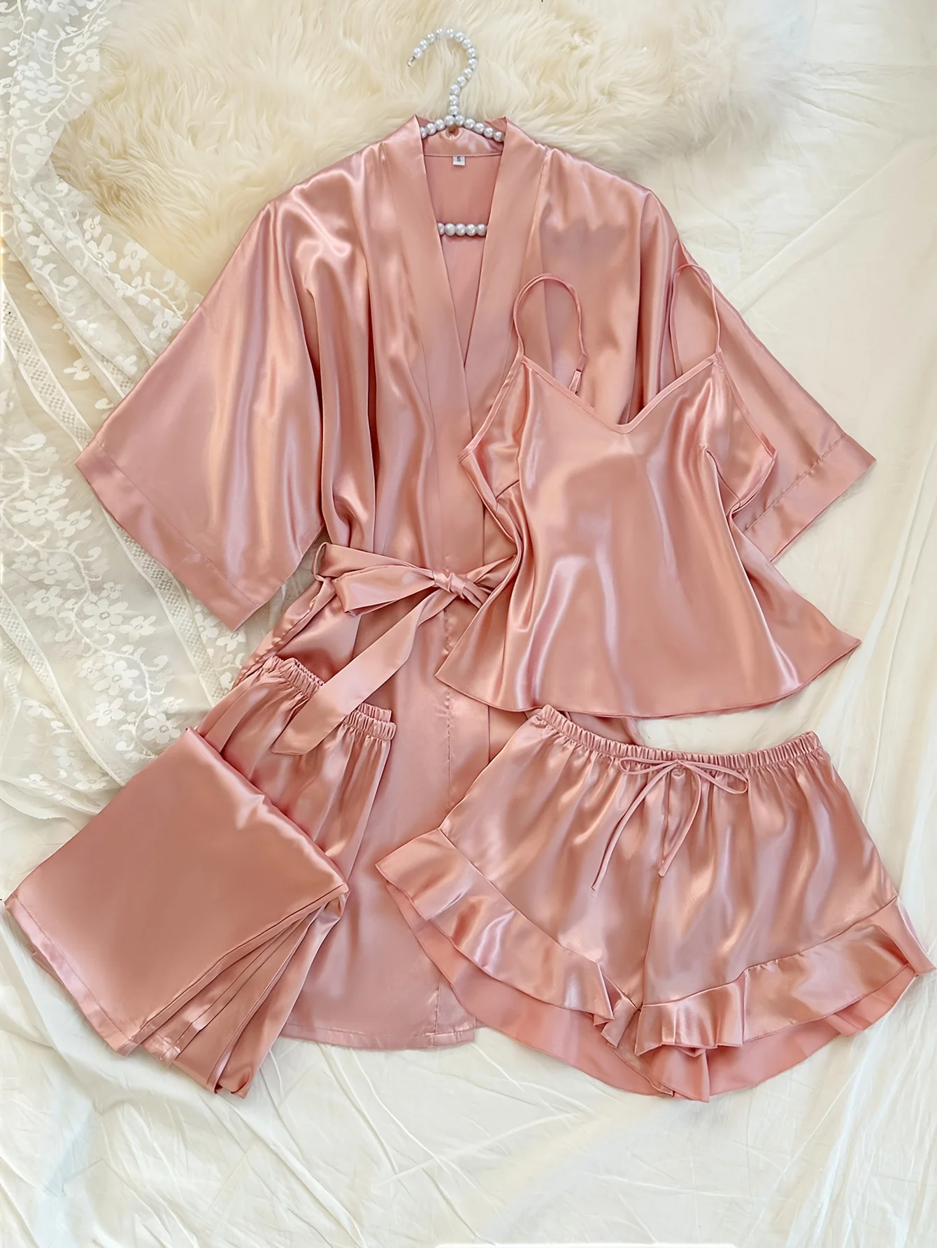 Women's 4-Piece Pajama Set with Kimono Robe Cami Top and Ruffled Shorts & Pants
Women's 4-Piece Pajama Set with Kimono Robe Cami Top and Ruffled Shorts & Pants